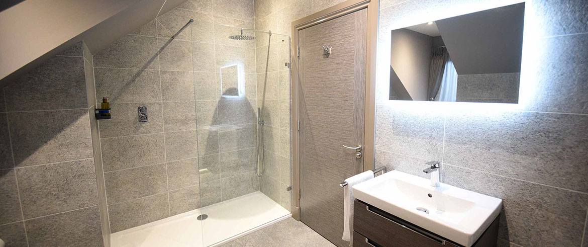 Our Luxury Guest House Accommodation in Portrer contains spacious modern en suite bathrooms