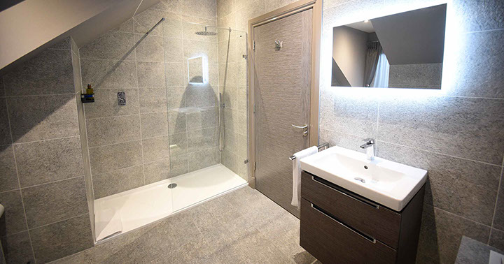 Our Luxury Guest House Accommodation in Portrer contains spacious modern en suite bathrooms