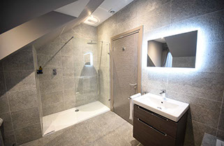 Our Luxury Guest House Accommodation in Portrer contains spacious modern en suite bathrooms